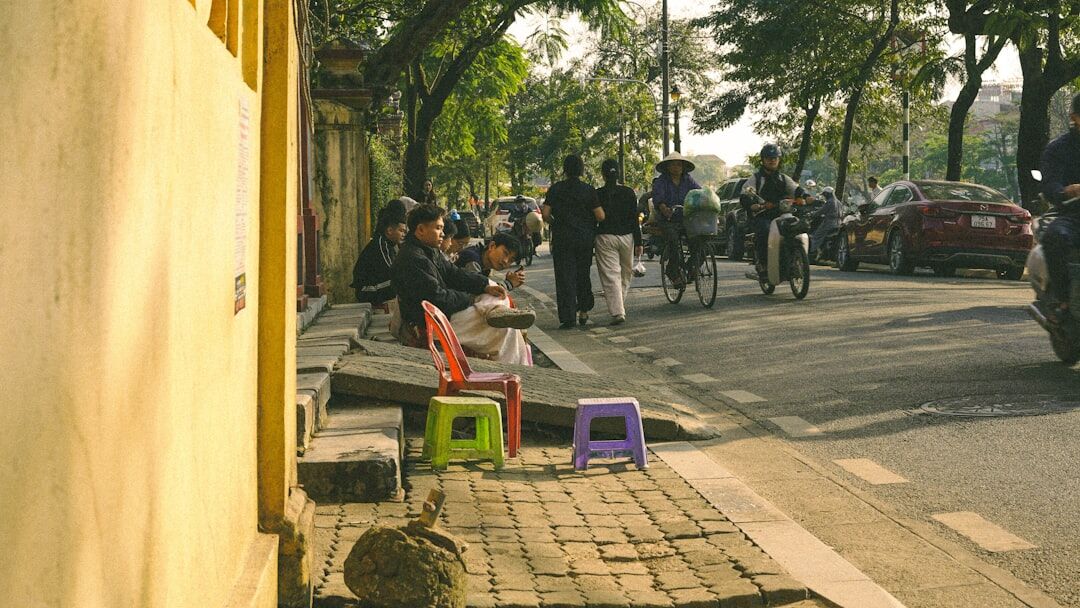 Reporter and camera operator filming an outdoor street interview
